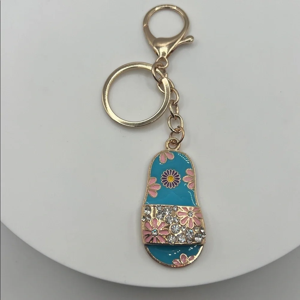 566. Gold and Blue Floral Sandal Keychain